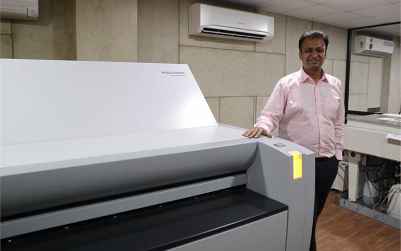 Sanket Todi, director, Krishna Creations, with the new Heidelberg Suprasetter