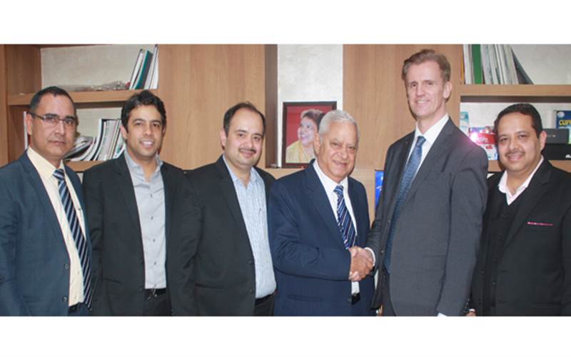 The Gulati family with Klaus Nielsen of Heidelberg India