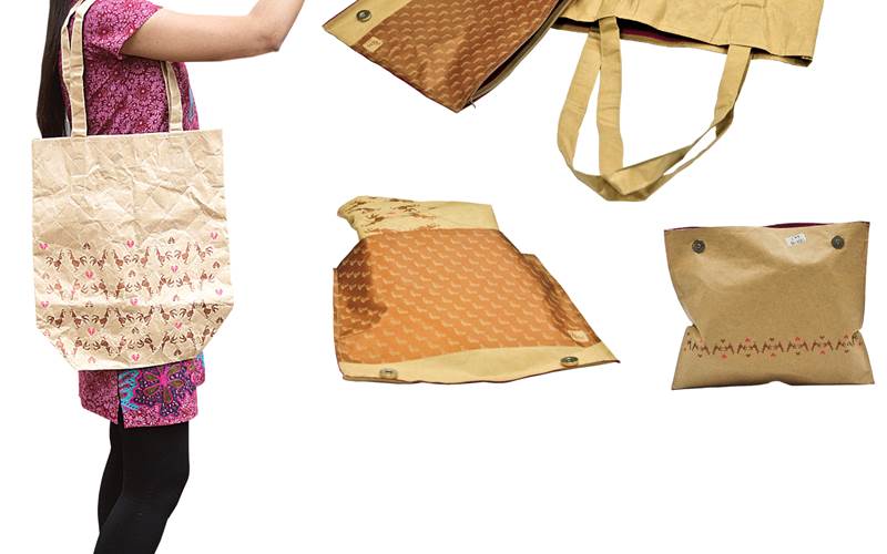 PrintWeek India Innovative Printer of the Year 2012 - Parksons Graphics. used a Sakurai flatbed press, outputting screen positive with a Prinergy workflow. Stitching was used as a post-press force. The bag is designed to be carrybag – a clutch and collapses into a travel pouch. The Bag produced for 61c had a run-length of 500 and used 105gsm Tyvek paper