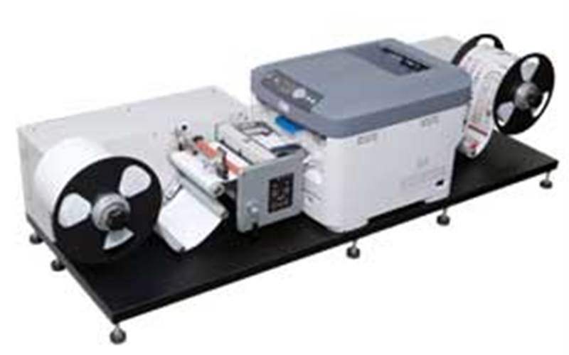 Arrow 216 - Arrow Digital:
          For longer runs you have the bigger flexo presses, but for on-demand and short-run jobs, and for printing labels in-house, there’s Arrow Digital’s digital label press, 216, says the company. Launched in May this year, this digital LED colour label printer is toner-based, roll-to-roll and can print on most paper/films at a speed of 9.3 mtr/min. That’s around 5,000 labels in two hours. Use the Arrow Label Finisher with the same model number, and you have a complete label you wanted, and quickly.
          Stall No: A40