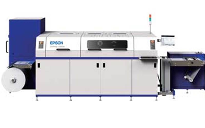 SurePress L-4033AW - Epson: Launched in India during the last Labelexpo, the L-4033 is a relatively new kid on the block. It has over 100 installations worldwide since its world debut three years ago and has added a white ink to its printing capabilities. The L4033 and L4033AW are both available to support various label applications of convertors. Epson may spring a surprise at the show, with the launch of Epson TM-C3510, a compact table-top label printer, if it does.
          Stall No: A38