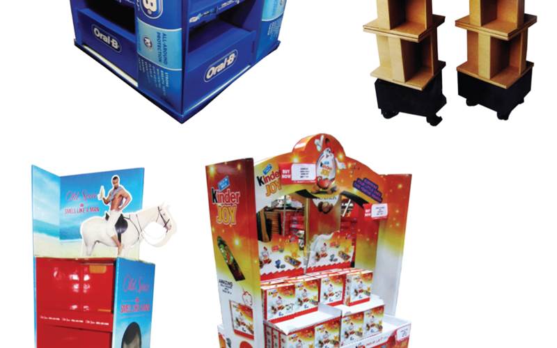PrintWeek India Point-Of-Purchase Printer of the Year 2013 - Jayna Packaging. Kinder Joy Arch display, Old Spice standing unit, Oral B island display and Rubber Band floor standing unit. All the entries were made from 100% recyclable heavy duty corrugated board with five-colour printing.
Explaining the Kinder Joy Arch, Jayna states that the client wanted to make an island display which would carry a stock of around 50kgs and be sturdy enough