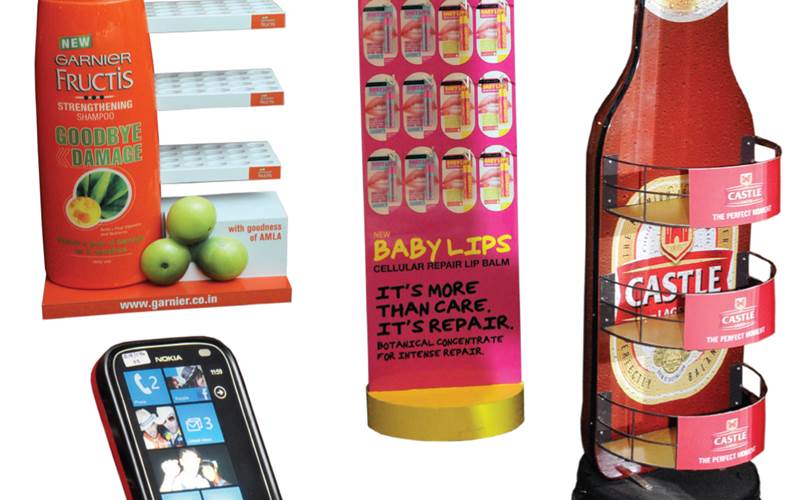 PrintWeek India Point-Of-Purchase Printer of the Year 2013 - Spectrum Scan. The Babylip FSUs has been printed on self-adhesive vinyl using HP latex 65500 six-colour wide-format digital press and mounted on the fabricated FSU with sunboard. The POP for Nokia is printed on the Atma screen printing machine, which has been thermoformed for shape and fabricated to form the display with programmed LED lighting