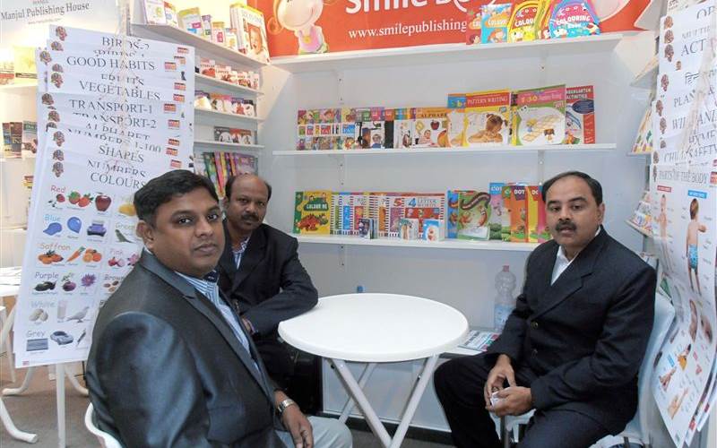 Representatives of Chennai-based Sivasakthi Offset Printers and Smile Publishing, at their stand.