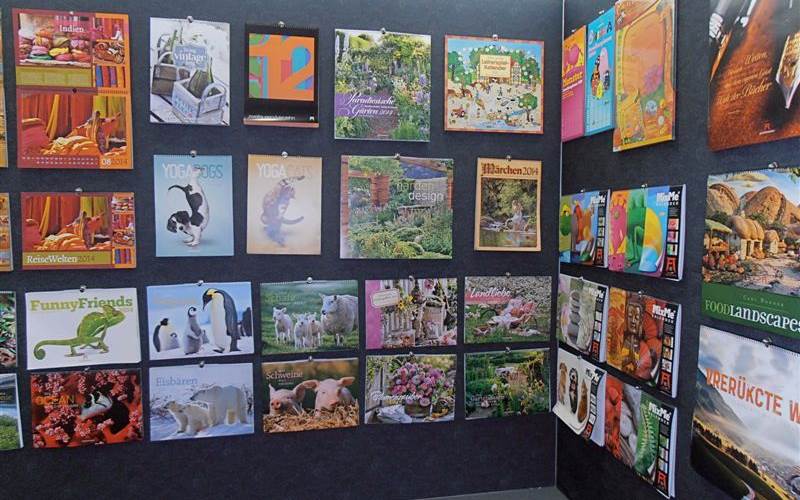 An array of printed calendars.