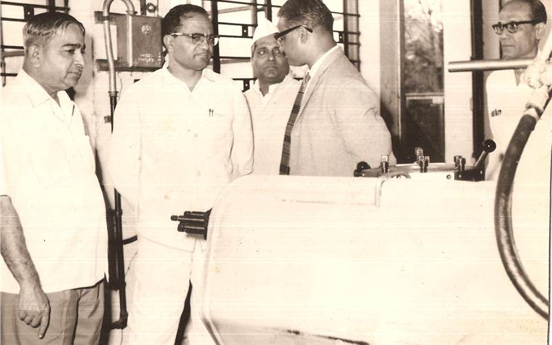 Marathe showcasing Traub machining centre to the visiting politicians