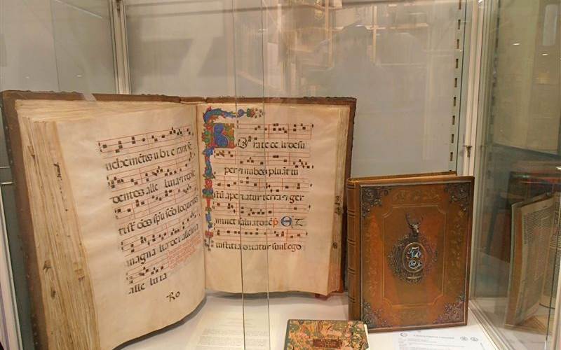 A large-sized book with musical notations.