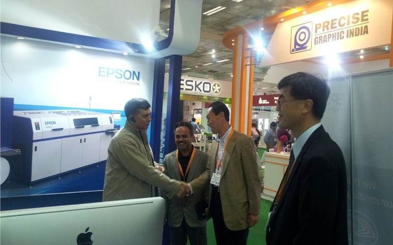 Pravin Savla of JP Print from Byculla confirming the Surepress deal with Epson top management at Labelexpo