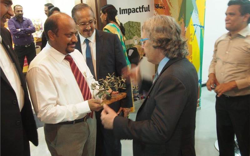 Alon Bar-Shany, vice president and general manager of Indigo division, HP inaugurated the centre and was all praises for Redington's efforts in setting up the Indian Centre of Excellence. He is seen presenting a memento to Ramesh Natarajan, president of Redington India. Kasturirangan, whole-time director and Ramesh KS, vice president of Redington India are also seen