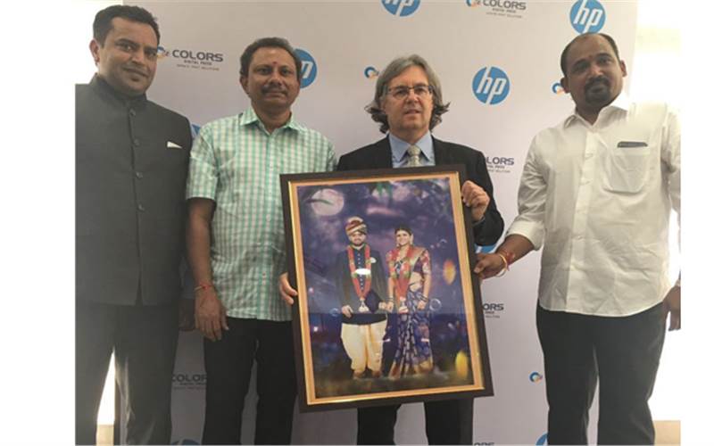 Speaking about the installation and Color Digitals Bar-Shany said that the seven colour press is capable of producing over two million colour sheets per month and is perfect for midsized to large companies. Appadurai, Chaitanya, Bar-Shany and Srinivas display a photo enlargement print from the 12000
