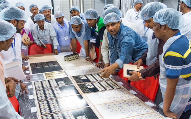 Bhargav Mistry with participants during the screen printing workshop