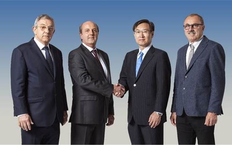 Epson global president Minoru Usui (second from right) with (from left) Sandro, Valerio and Riccardo Robustelli
