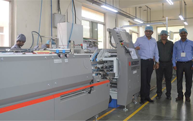 Mumbai-based Printmann has invested in a Bobst Expertfold with Accubraile, it's second, to accelerating the delivery of jobs requiring Braille. “Today 70-80% of pharma jobs require Braille. After the installation, our productivity has increased by 25%,” said (l) Tejas Tanna, director at Printmann