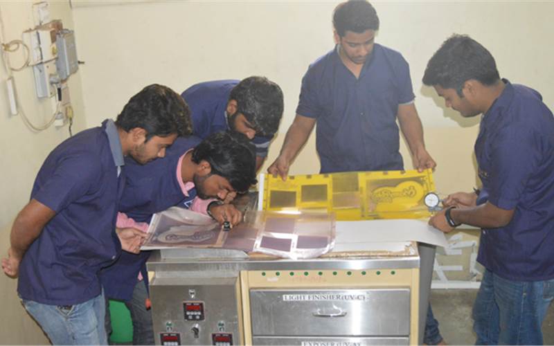 Students at work in flexo plate processing lab