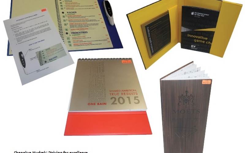 PrintWeek India Digital Printer of the Year 2015 - Chanakya Mudrak. The four samples that Chanakya sent for evaluation were Bombay Blue Menu for Bombay Blue, EY Invitation, Bain & Co Calendar 2015 for Bain & Co and Moet’s Bar Menu for Moet