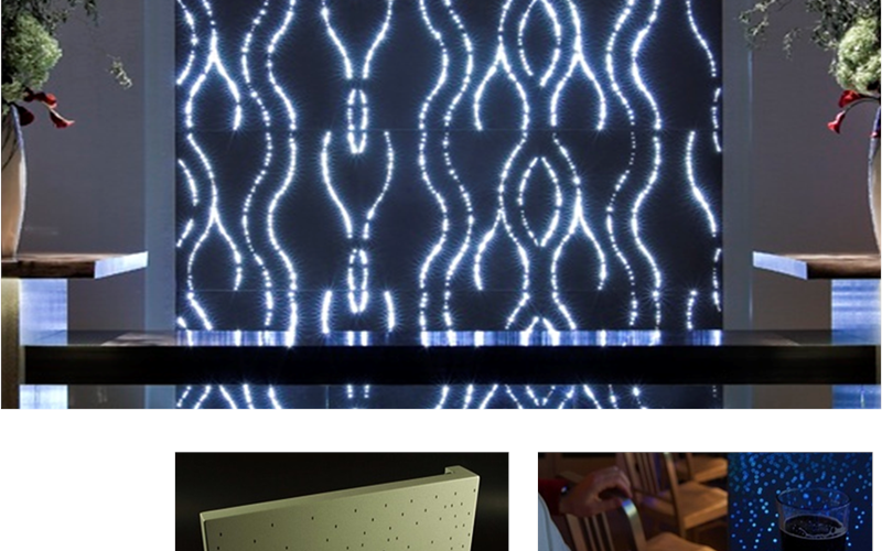 This is a concrete video screen. Fibre optics are embedded in to the concrete and the wall functions as a screen