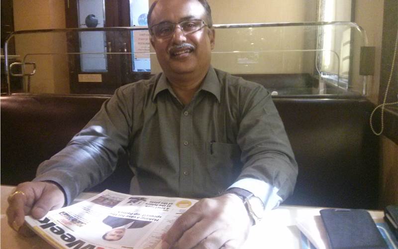 Tushar Dhote, the co-chairman of Pamex with the PrintWeek issue cover