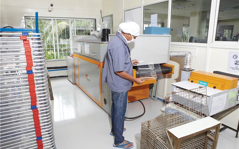 Grafica's compact machines power the IR and UV drying at Keetronics.