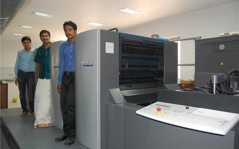 Palani (c) with the brand new Speedmaster SM74