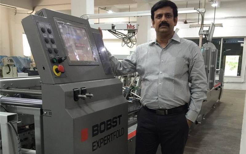 <a href="http://www.printweek.in/News/401376,jc-graphics-shores-up-post-press-might-with-bobst-and-wen-chyuan.aspx" style="color: white" target="_blank">Vijayawada-based JC Graphics has now bolstered its finishing department with Bobst Expertfold folder-gluer and Wen Chyuan offline coater and MetPET lamination machine</a>