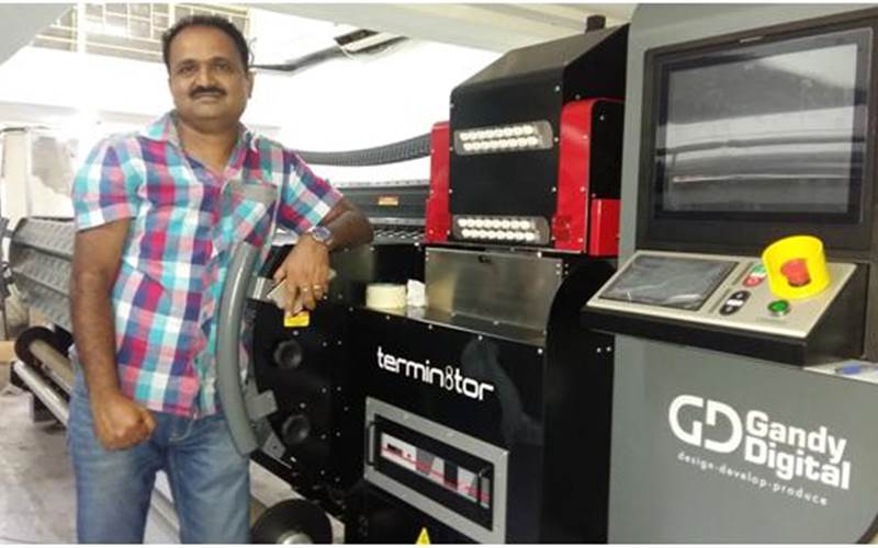 <a href="http://www.printweek.in/News/401327,bengalurus-ace-media-solution-picks-indias-first-gandy-termin8tor.aspx" style="color: white" target="_blank">Bengaluru-based signage specialist, Ace Media Solutions, has installed India’s first Gandy Termin8tor</a>