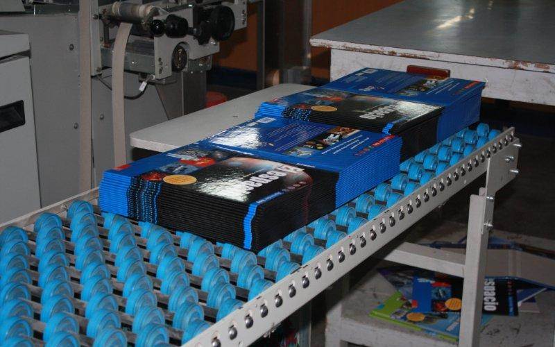 Samples of hardbound covers at the unit