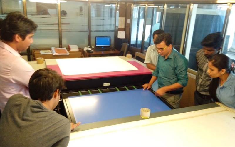 Pritesh N Girkaar, production manager at Indigo Press explaining the process of Cron CTP to the <i>PrintWeek India</i> team