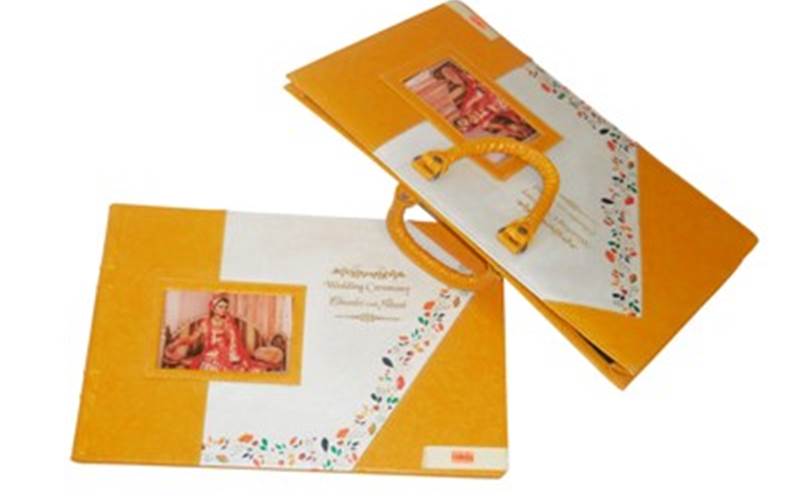 KLICK DIGITAL PRESS | SuratArt: CMYK with light Magenta and light Cyan
          Press: HP Indigo 5500 and four colour printingPost-Press:  Cover pad printed on leather and leather bag with CNC engraving and acrylic windowPaper: TechNova Luster