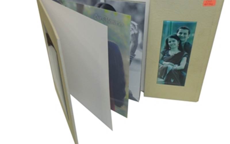 SHREE PRINTWELL OFFSET | AhmedabadLength of run: OnePress: HP Indigo 3500 six-colour pressPost-Press: Side by side pasted album with matt laminationPaper: Art paperSpecial feature: Back to back pasting done with the leather jacket