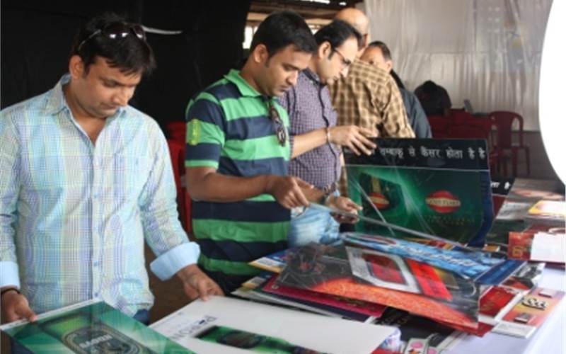 The delegates who comprised designers and production managers from advertising agencies looked at the print samples on display