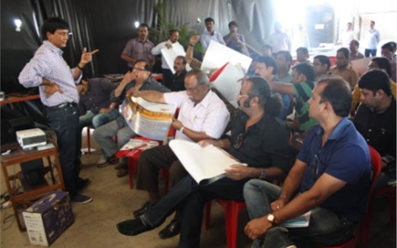 Delegates looking at the print samples and were surprised to know that a Rs 40,000 per kg ink is what defines printing