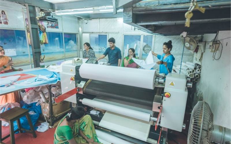 Post the final artwork, the Taxi Fabric team fixes a schedule for production which starts off with printing