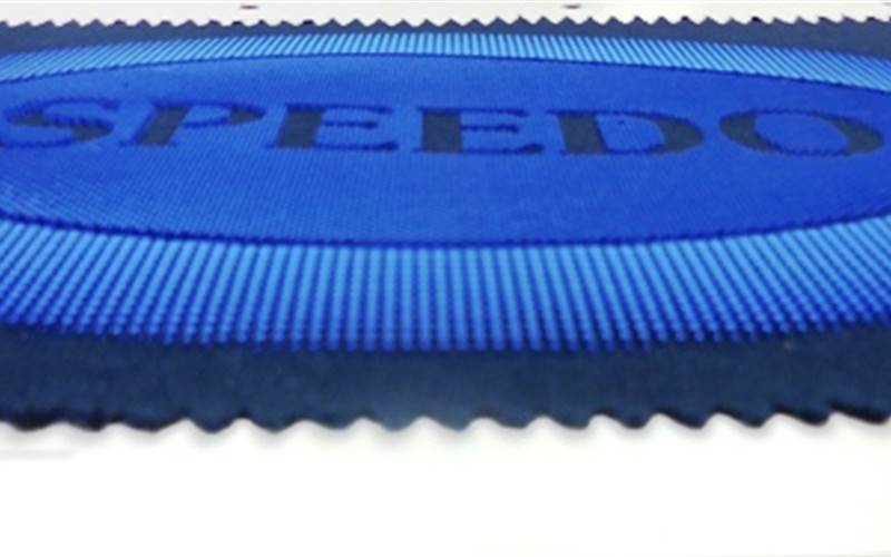 Texopaque classic OP plastisol high density paste is used to create a raised effect. This effect is achieved by three stroke printing and cured. This process is repeated five time