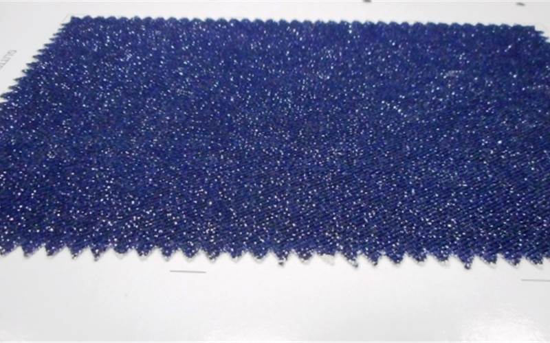 This image shows the glitter print effects on denim. A mixture of Texiscreen aqua AJ382 metallic ink medium plus metallic glitter powder in the ratio of 95:5 is prepared to achieve this effect