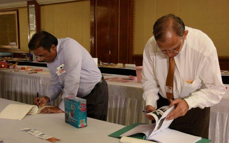 Every print sample accompanies description of the print jobs. Kiran Prayagi, a stickler for perfection, checks the process used to produce the sample he was judging