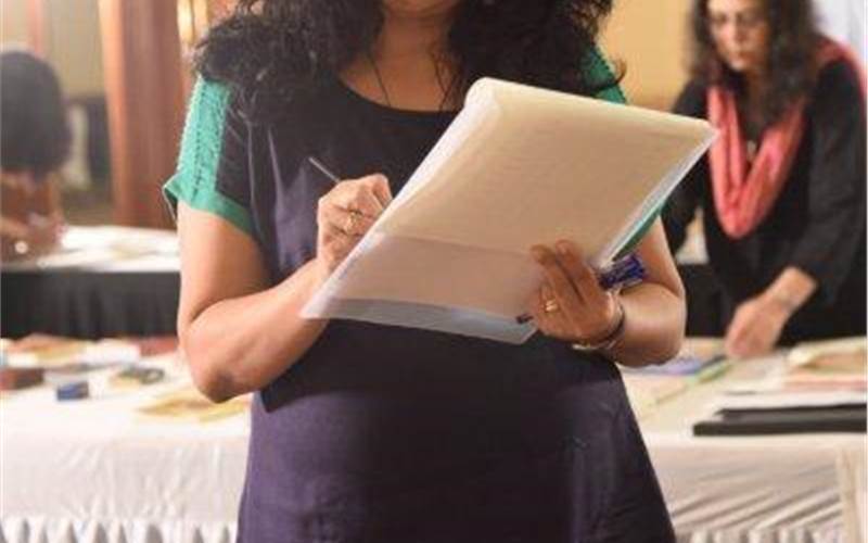 Nandini Dias, COO of Lodestar marking points to a print sample