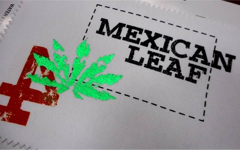 The foil effect is achieved by water-based Texiscreen aqua ink, After which a Metatran foil adhesive is printed and cured onto which foil paper is placed and fused