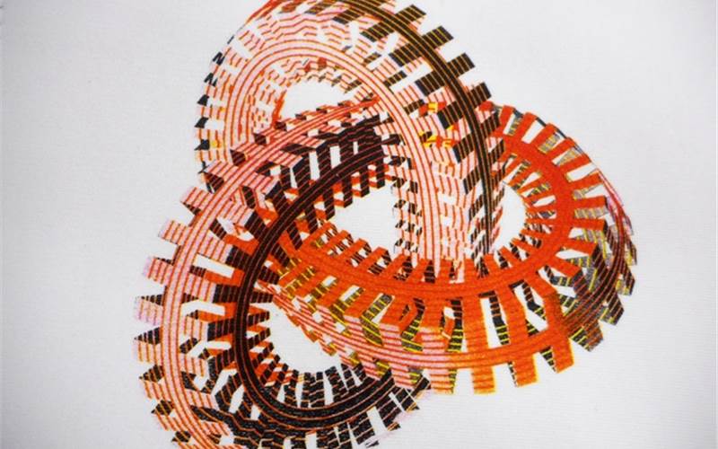 The effect is achieved by using Texiscreen aqua water-based ink - halftone print