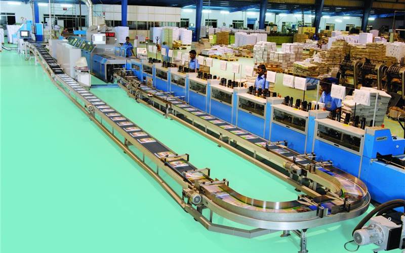 In the picture is the Acoro A5 perfect binder + Automatic Gatherer ZTM1571 with 18 station