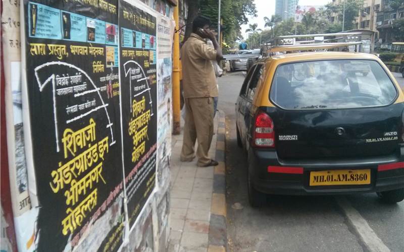 A different type of OOH: The poster of my favourite Marathi play at a busy street corner in the working class bastion of Mumbai