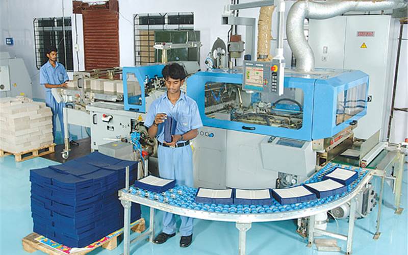 A complete hard cover book line with a Horauf case maker (in the picture), a Kolbus book block preparation unit and a Muller Martini casing-in line can produce upto 50,000 books a day