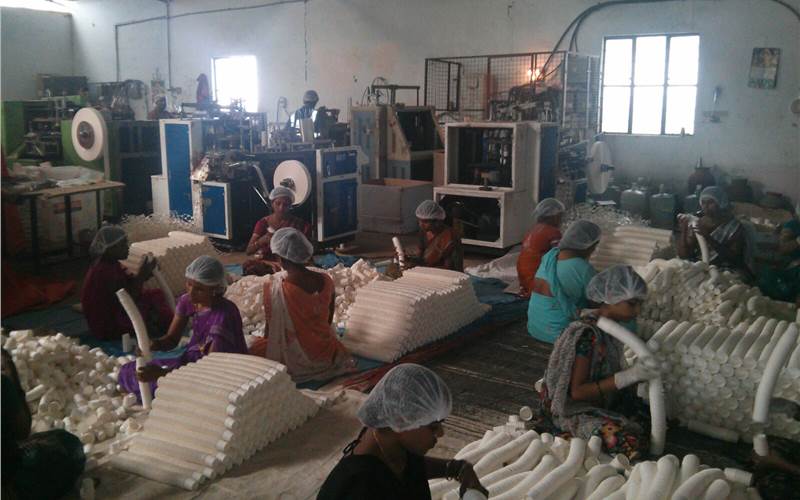 A busy paper cup factory in Hyderabad which is combating the threat from disposable plastic cups