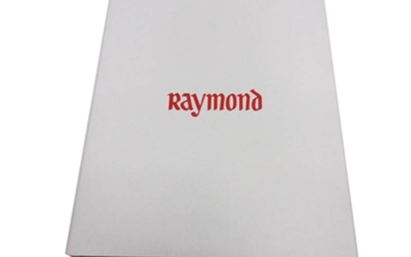 JAK PRINTERS | RaymondLength of run: 3000Art: CMYK plus online aqua satin varnishPre-Press: Heidelberg Prinect workflow and Suprasetter used plus Epson Stylus 9880 with EFI software Press: Heidelberg Speedmaster 102 (five-colour)Post-Press: Thermal gloss lamination done on jacket and hardcase cover on the BEW Thermolam 800RPaper: Sappi Magno SatinSpecial feature: Section sewing done on polygraph for binding. Hardcase cover making and book black fitting was done manually