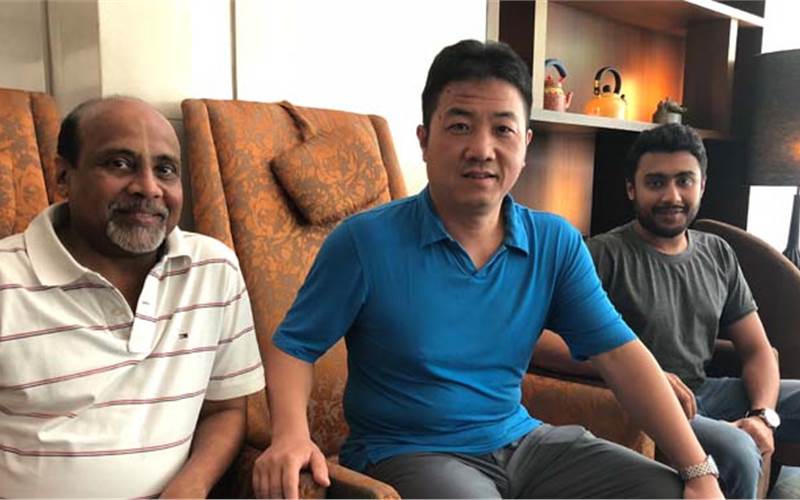 (l-r) Suresh Shah, Wang Zhi and Kaushil Shah