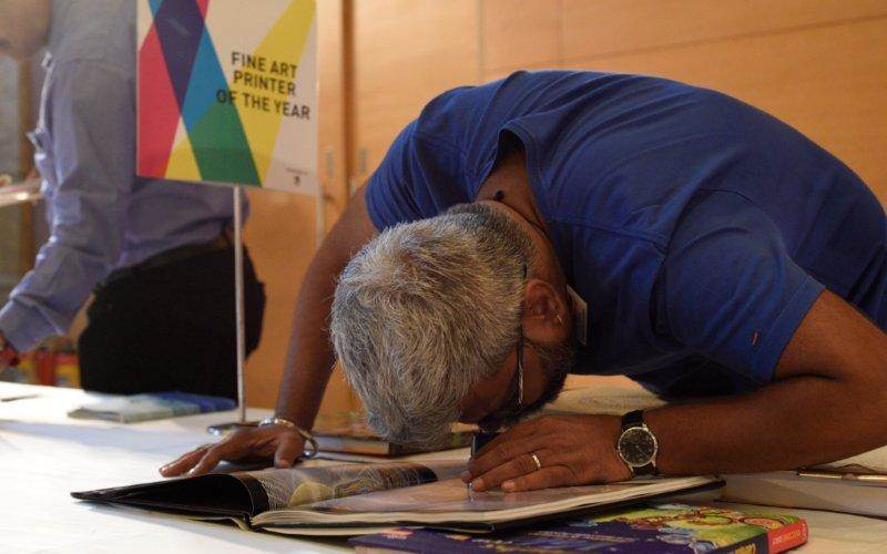 Ajay Takalkar scrutinises the entries in the competitive category of Fine Art Printer and Innovative Printer. He said, he was looking for retouching, colour balancing and fantastic reproduction of images. He said the high points included tri-tone images throughout, inline gloss varnish to images and cloth-wrapped front and back boards