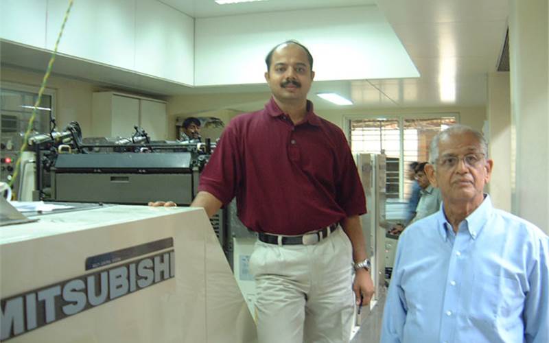 Anil Joshi and his father of K Joshi and Co with the Mitsubishi at their press in Pune