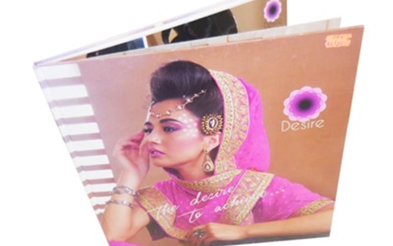 PROGRESSIVE PRINTING PRESS | DesireLength of run: 500Art: Title printed with Kaleido inks using RGB filesPre-Press: GMG SolutionsPress: Komori (four colour)Post-Press: FoilingPaper: Fine textured paperSpecial feature: Enhancing the colour gamut on cover page