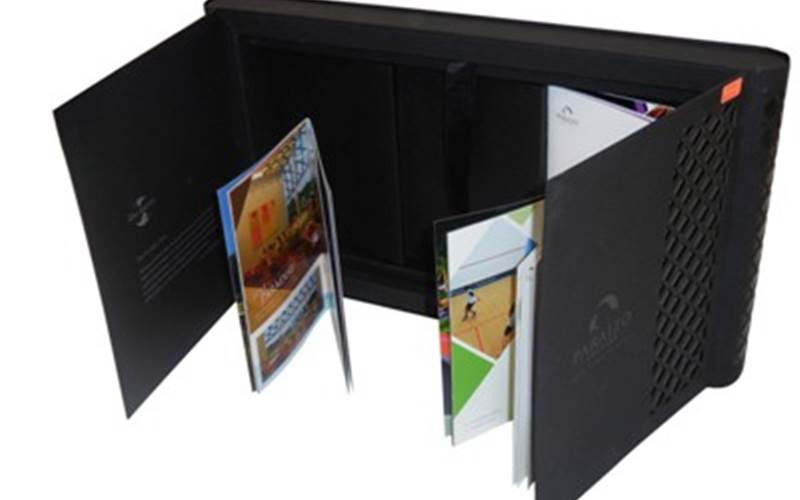 PRAGATI OFFSET | Paraizo - The ClubLength of run: 1000Art: CMYKPre-Press: Output on CTP using 200lpi screeningPress: Komori Lithrone 740Post-Press: Silver foiling and spot gloss UV on all brochures, embossing on the title of the main brochure, four vertical gatefolds in the main brochure, rigid outer box with rounded sides sand laser cut, the construction allows for three receptacles for smaller brochures. Magnets to hold flaps closedPaper: For the three small brochures: 220gsm art matt for inner pages and J77 for cover. For the main brochure: Rendezvous: 240gsm for the cover and 130gsm for the postersSpecial Feature: The intricate box design echoes the architectural features of the club with rounded sides and diamond shaped cut-outs.