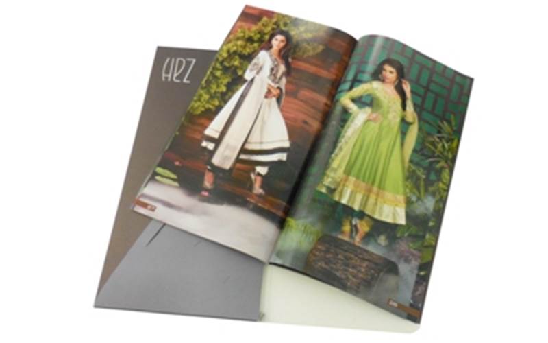 JAK PRINTERS | ZahLength of run: 1500Art: CMYK + online aqua gloss varnishPre-Press: Heidelberg Prinect workflow, Suprasetter CTP system, Epson Stylus Pro 9880, EFI Fiery XF, Glunz & Jensen Raptor Pro 85tPress: Heidelberg Speedmaster CD102-7+LX (28×40, seven-colour plus coater)Post-Press: Hot foil stamping, embossing, and die-cutting on the cover, and hot foil stamping, debossing, and die-cutting on slip and case. The thermal matt lamination on slip case was done on BEW Thermolam 800R. Section sewing done on polygraph and perfect binding on WelboundPaper: Magno Satin from Sappi for the inside pages, Modi-Dore from Cordenons for the cover, and B K White Back duplex board for the slip caseSpecial Feature: Section sewing done on polygraph