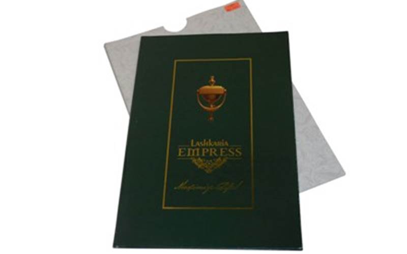 DHOTE OFFSET | Lashkariya EmpressLength of run: 1000Design: We suggested a window on the envelopeArt: CMYKPre-Press: Kodak Prinergy Evo workflow and GNG ColourProofPress: Ryobi 664AJ (fully automatic - 20x25)Post-Press: Aqueous varnish, gold foiling, spot UV, punching, section sewing and hardcase binding. Plus transparent plastic window patching on envelope with gold foilingPaper: 160gsm Mont Blanc for cover and 270 gsm for the inside pages